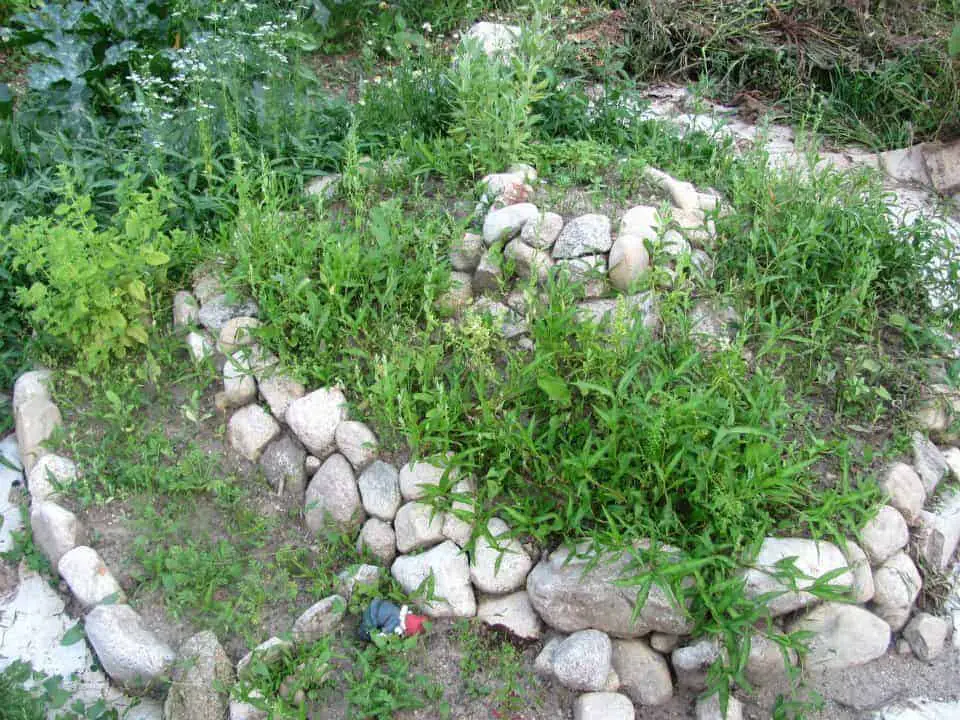 rock garden beds + too many weeds!