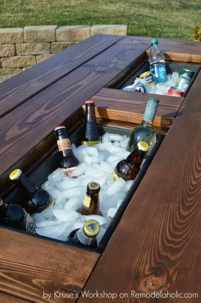 DIY backyard table with drinks in the middle