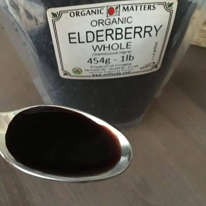 Homemade elderberry syrup for helping kids