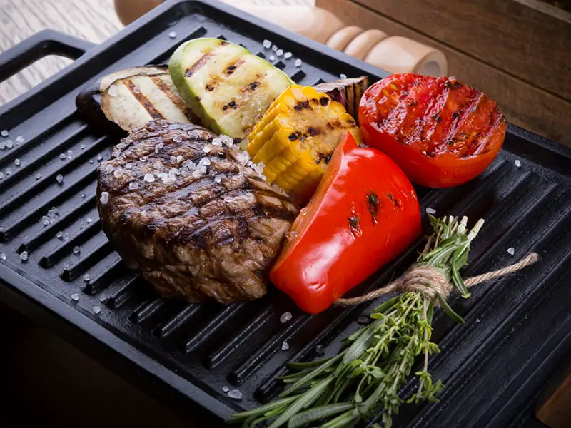 Grilled Meat, Corn, Zucchini, and Tomatoes